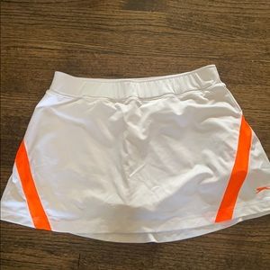 Tennis skirt with orange stripes